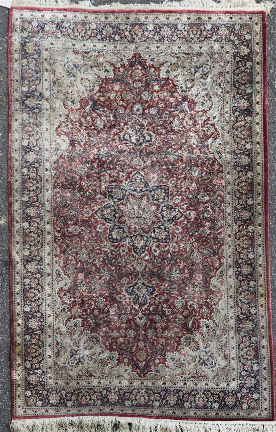 A silk Qum rug, 5ft 2in by 3ft 1in.